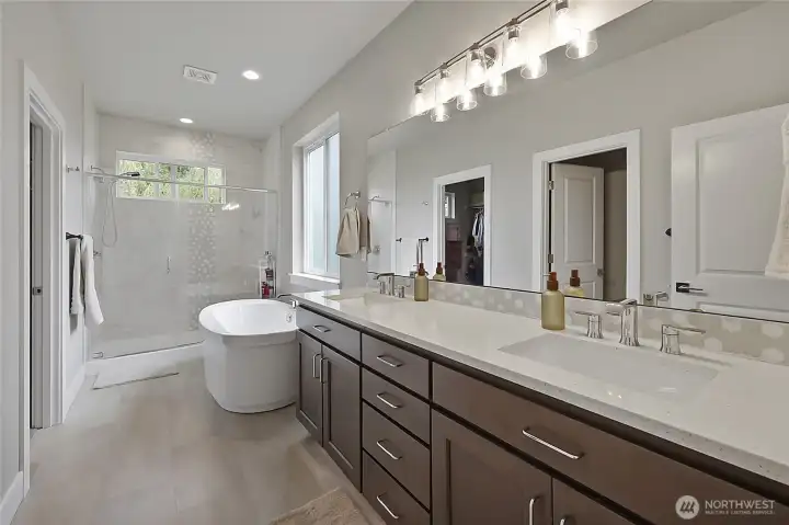 Primary bath: Shower, Soaking tub, Dual vanities.