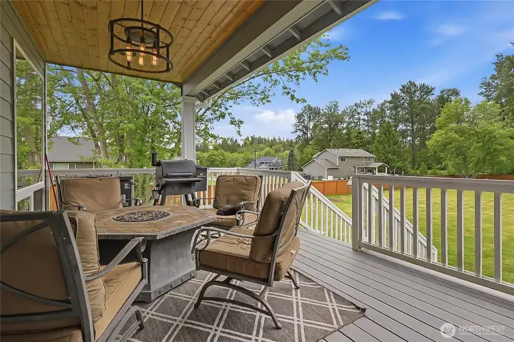 Covered porch overlooking your own acreage.