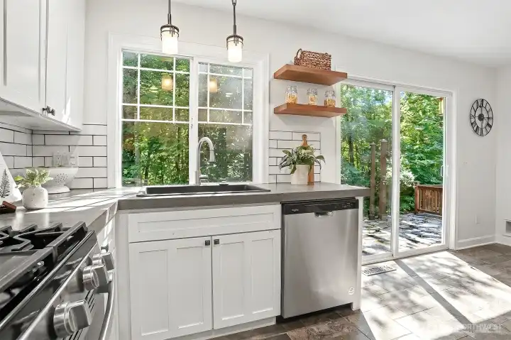Sliding door goes to the beautiful back yard. Sliding door goes to the beautiful back yard.