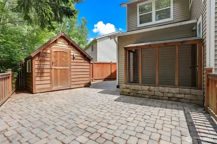 Your own special catio. And the shed is ready for all the outdoor stuff. Your own special catio. And the shed is ready for all the outdoor stuff.