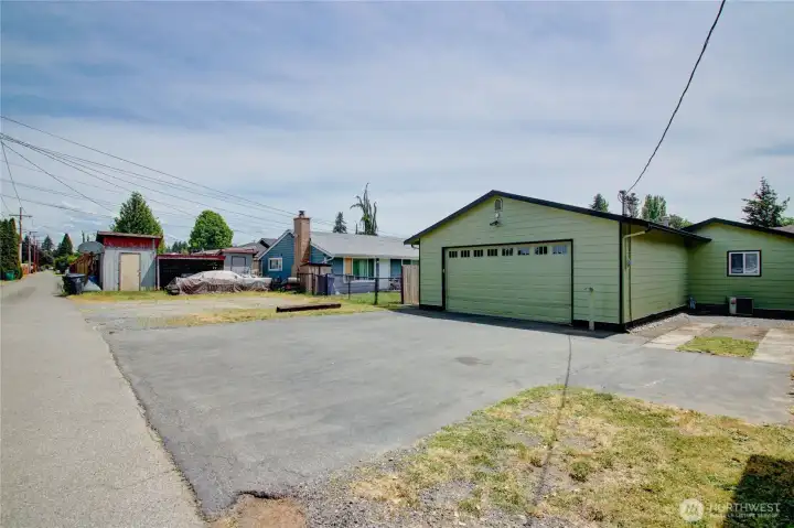 Alley looking east, RV/Boat parking (right) and driveway parking