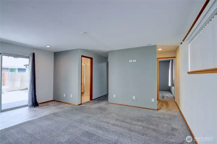 Primary bedroom with 3/4 bath and walk-in closet