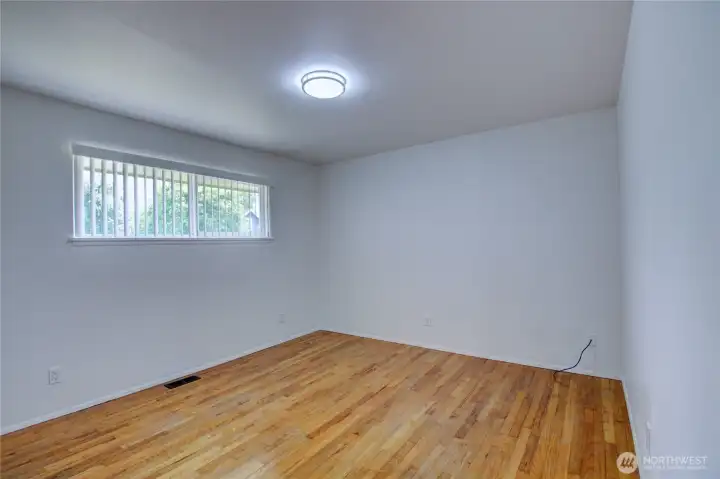 Bedroom 1 with beautiful hardwood floors