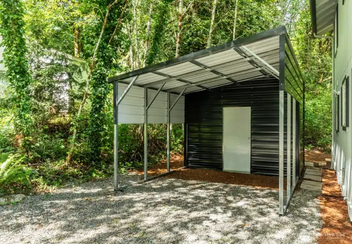 New steel carport with locking storage area