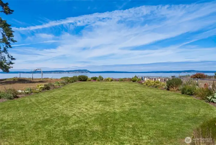 Virtually enhanced grass leading to sandy beach. Virtually enhanced grass leading to sandy beach.