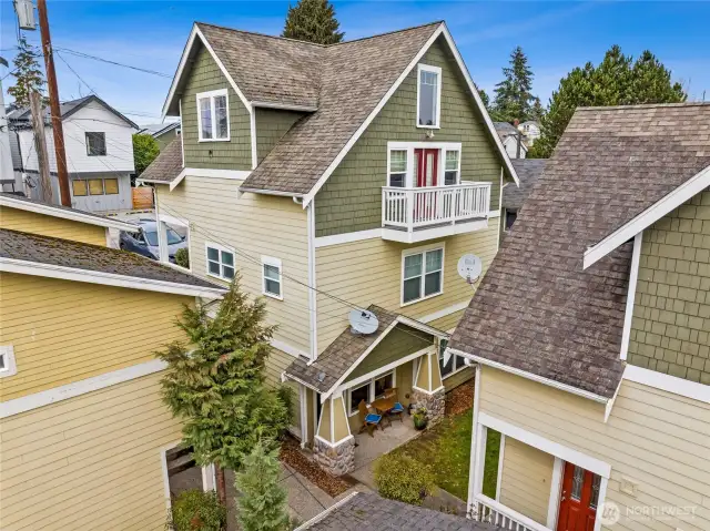 This boutique condo community is composed of the two buildings front and back-- just four units in total. Easygoing neighbors, low stress HOA.