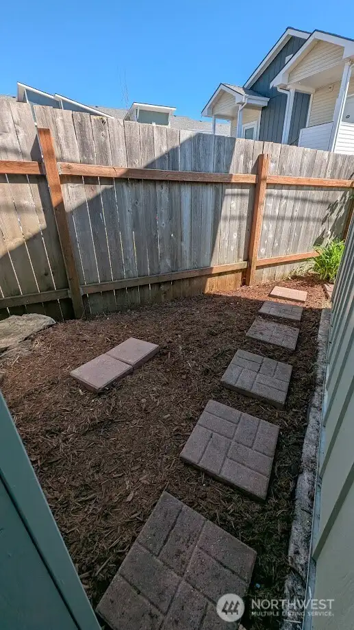 behind home