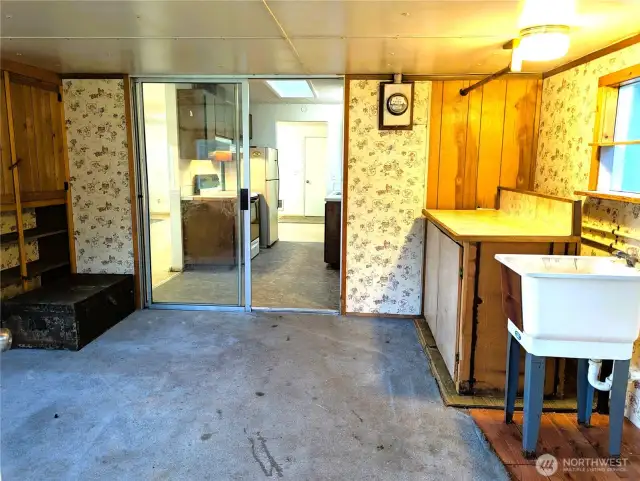 Utility Mud Room with entrance from back yard.