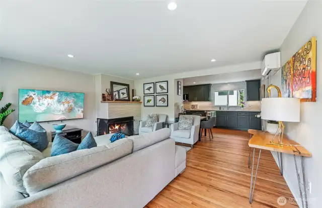 Step inside to your warm and inviting living room with real wood fireplace. Hardwoods throughout home.