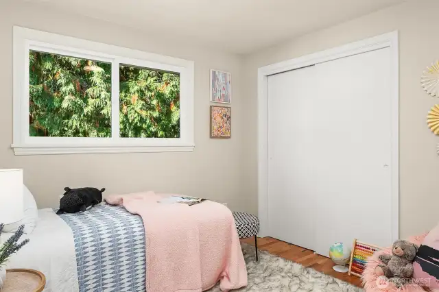 Third bedroom looks out onto the private backyard. It is currently being used as an office. This picture is from a previous listing.