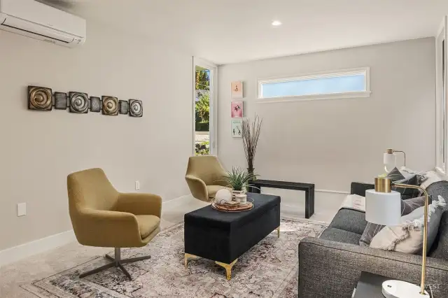 Second living space has its own mini-split air conditioning unit. This could easily be used as a second primary bedroom as it has its own bathroom. Picture is from a previous listing.