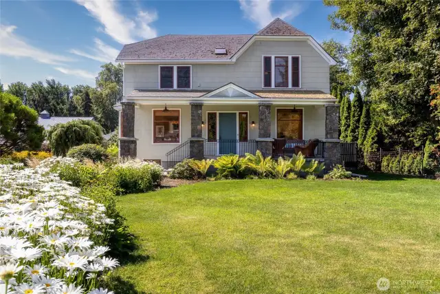 Nestled on 2.44 acre lot with Shop, ADU & inground pool.