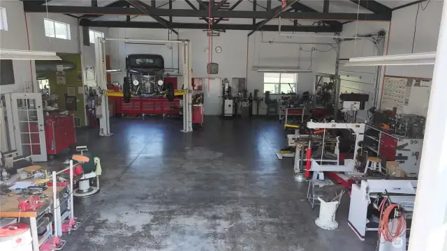 First section of the shop has Heat, office, laundry, 3/4 bath.