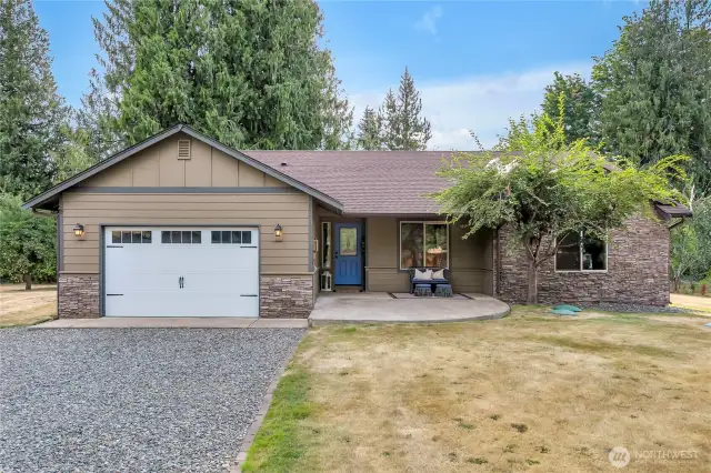 Charming rambler with 3 beds, 1.75 baths, and an attached 2 car garage