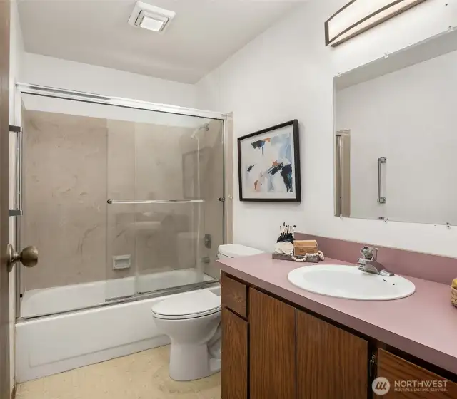 One of two full bathrooms