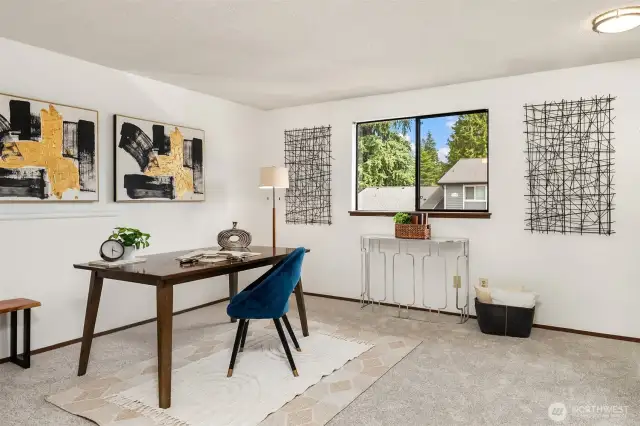 The second bedroom is staged as an office.  Both bedrooms are very spacious, light and bright!