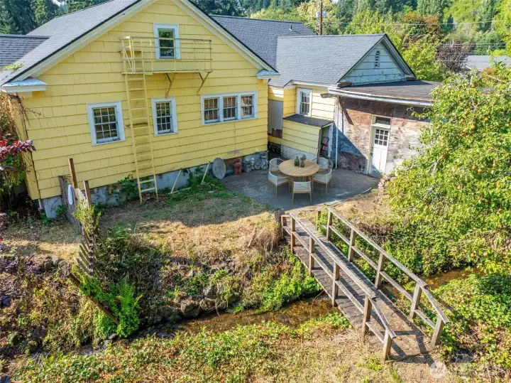 View of Backyard/Patio/Creek-Virtually Staged