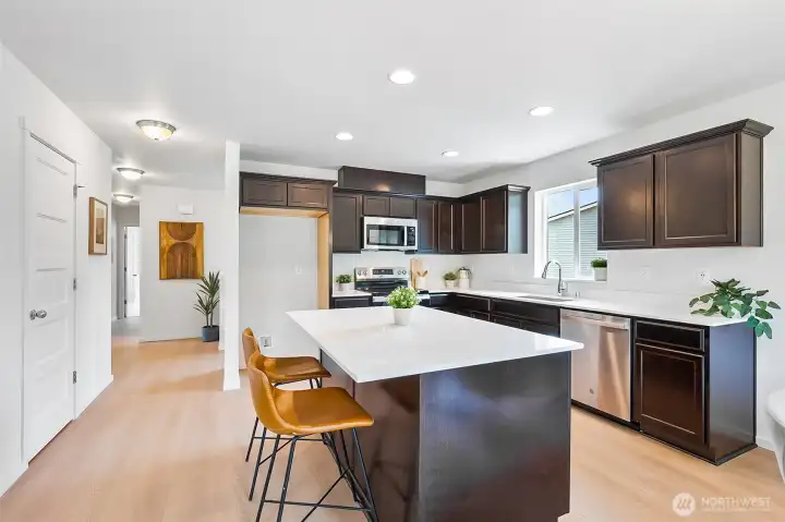 Photographs are for illustrative purposes only. Features, finishes, interior/exterior colors, landscaping and floorplan shown may vary from actual homes built.