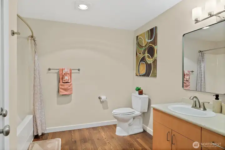 This bathroom is so spacious with an added linen/ storage closet