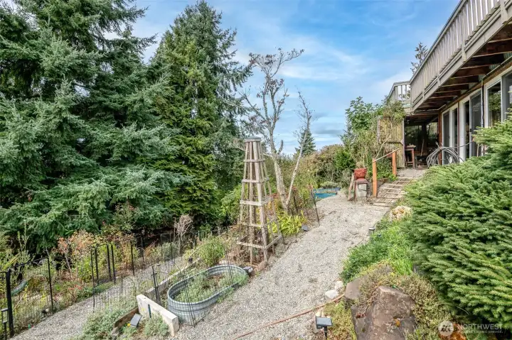 The lovely terraced yard gives plenty of space for you to use your creativity in the garden