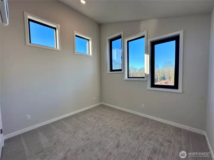 Bedroom 2 with a lot of natural light and nice views