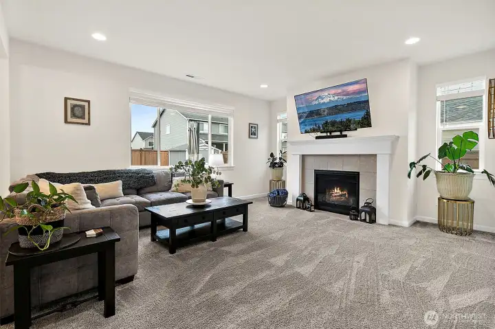 Welcoming fireplace in living room.