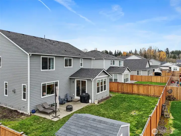 Backyard with expanded patio.