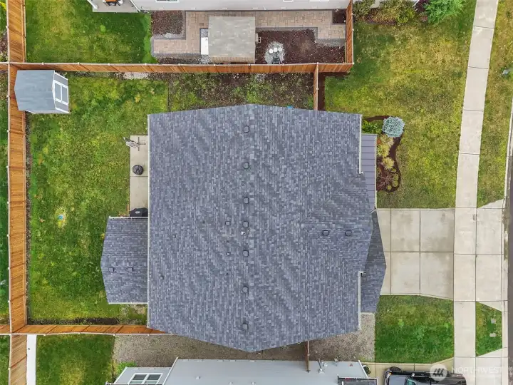 Back yard with storage shed.