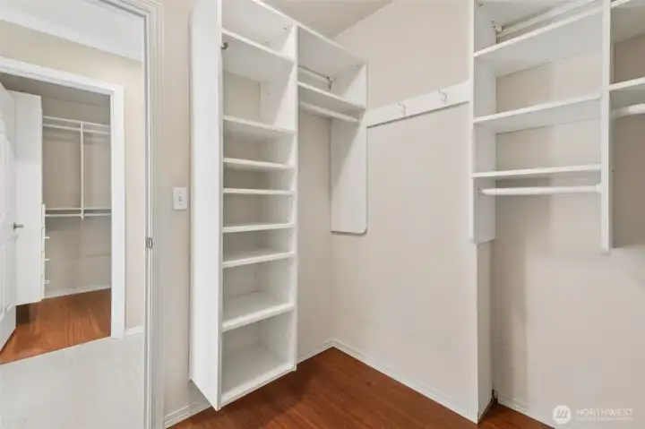 Note in this photo we are in one primary bedroom walkin closet and there is ONE MORE in this shot on the other side of the hall! TWO!!!