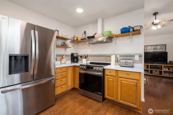 Kitchen with new solid surface countertops. and new appliances.