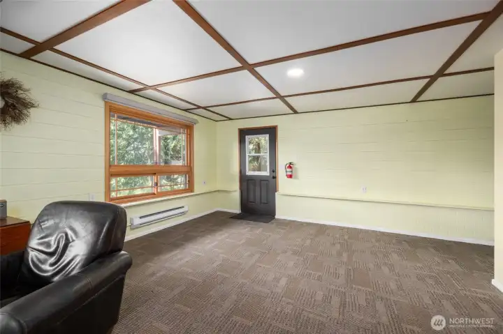 Lower level family room or bedroom.