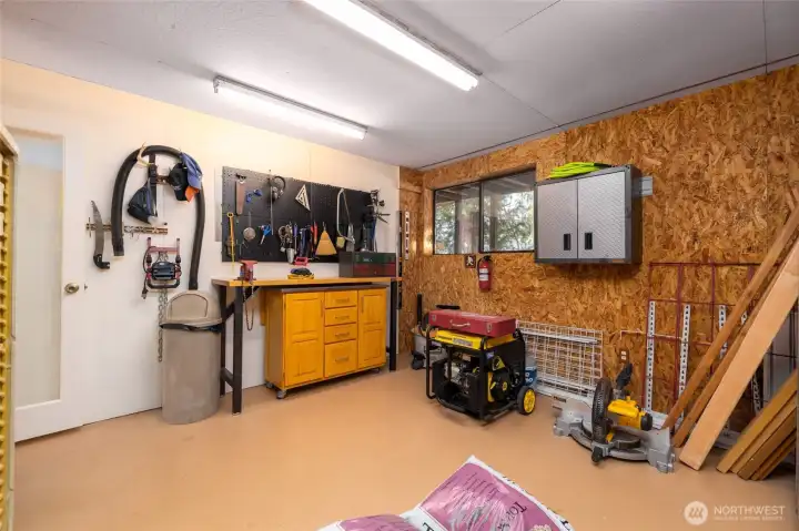 Workshop room downstairs, or convert to another bedroom.