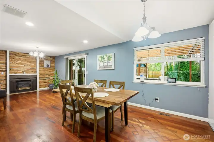 Dedicated dining area with elegant lighting, perfect for formal dinners or casual meals.