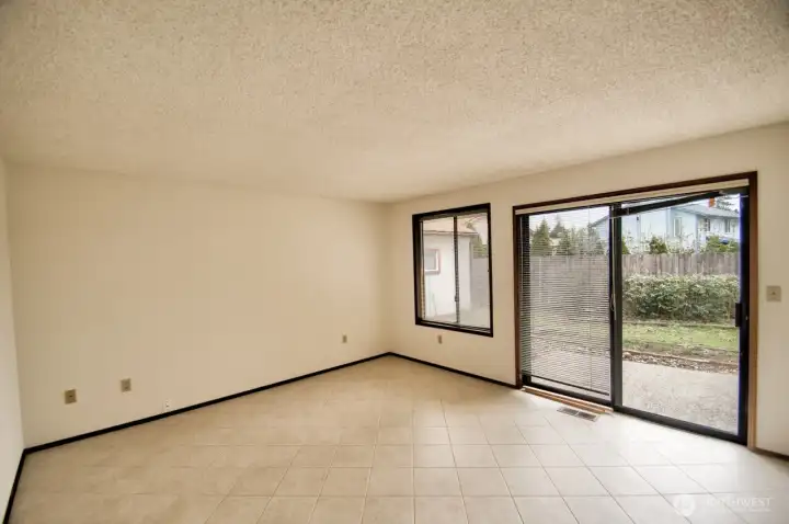 Family room with slider to backyard.