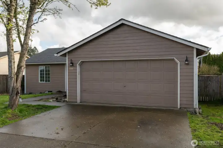 View of driveway and garage.