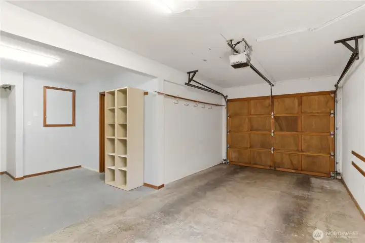 The lower level garage enables interior access to the home away from the elements outside.