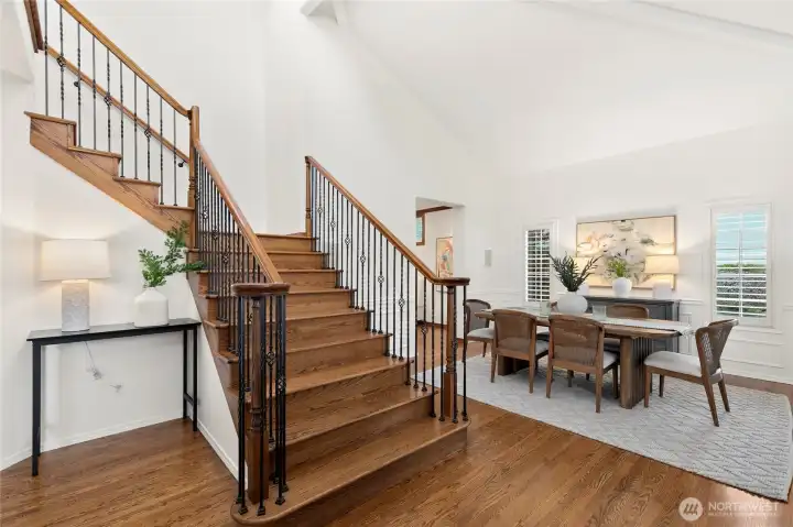 Grand staircase, beautiful hardwoods and vaulted ceilings greet you when you walk through the door