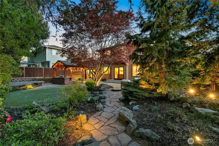 Lush and beautiful backyard which includes amazing upgrades