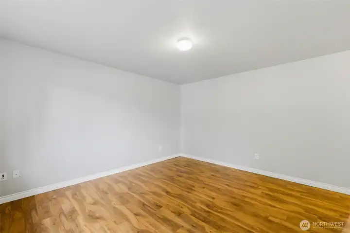 Flexible lower-level bonus room adapts to your lifestyle, whether you need a home office, hobby space, workout room, or additional living area Flexible lower-level bonus room adapts to your lifestyle, whether you need a home office, hobby space, workout room, or additional living area