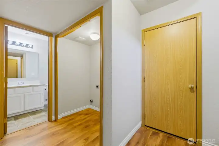 downstairs bathroom, laundry area and door leading to the garage downstairs bathroom, laundry area and door leading to the garage
