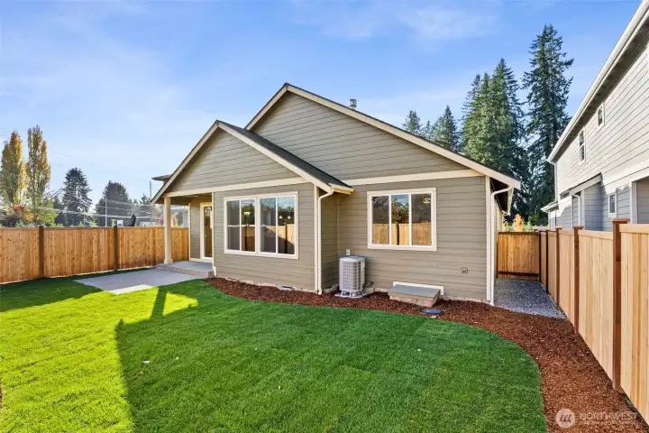 Back yard is fully fenced, landscaped with sprinkler system. Back yard is fully fenced, landscaped with sprinkler system.