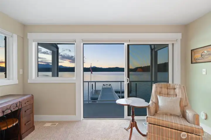 View right down the dock from the deck located off the primary suite. View right down the dock from the deck located off the primary suite.