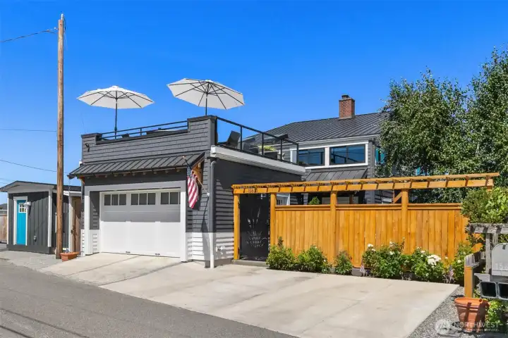 3 dedicated parking spots outside! Notice the height of the garage and home from the road. 3 dedicated parking spots outside! Notice the height of the garage and home from the road.