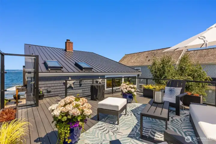Stunning 430+ sqft deck above the garage. Fully glassed in to block any sea wind to enjoy those less favorable weather days. Stunning 430+ sqft deck above the garage. Fully glassed in to block any sea wind to enjoy those less favorable weather days.