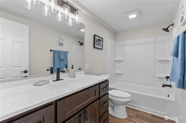 Secondary Full Bathroom w/New Oversized Vanity, Laminate Floors, Tub/Shower Combo.