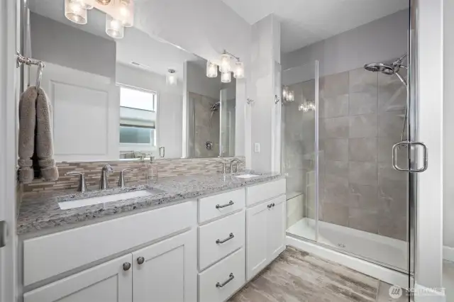 Double sinks and walk-in shower