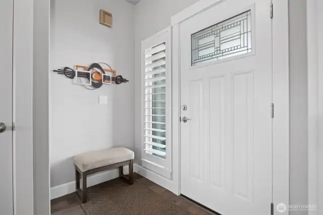 Foyer with dedicated coat closet