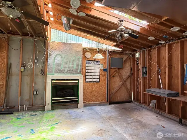 Electrical panel and wiring are present but not connected