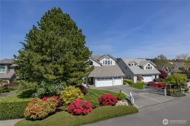 Mature landscaping and manicured park-like setting.