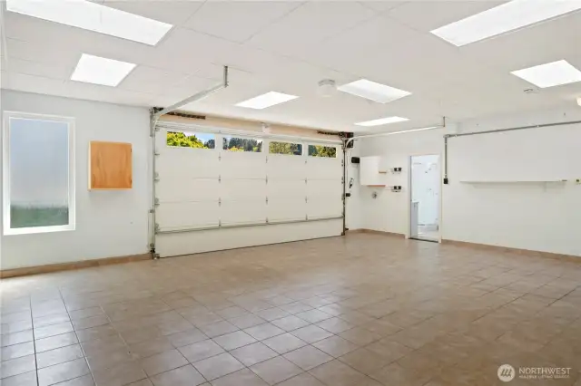 Before you park your car in this immaculate garage, you can give it a bath with warm water from the adjustable faucet!